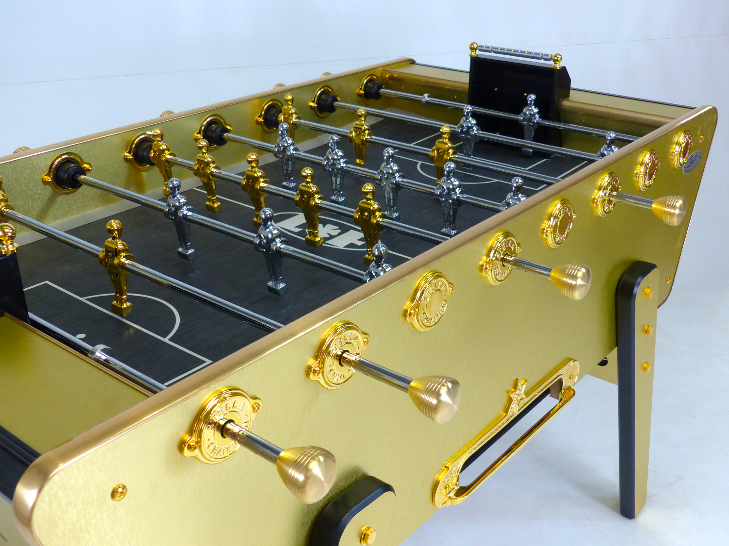 Full view of the Stella Champion Gold foosball table with its luxurious gold-plated finish and sturdy wooden frame