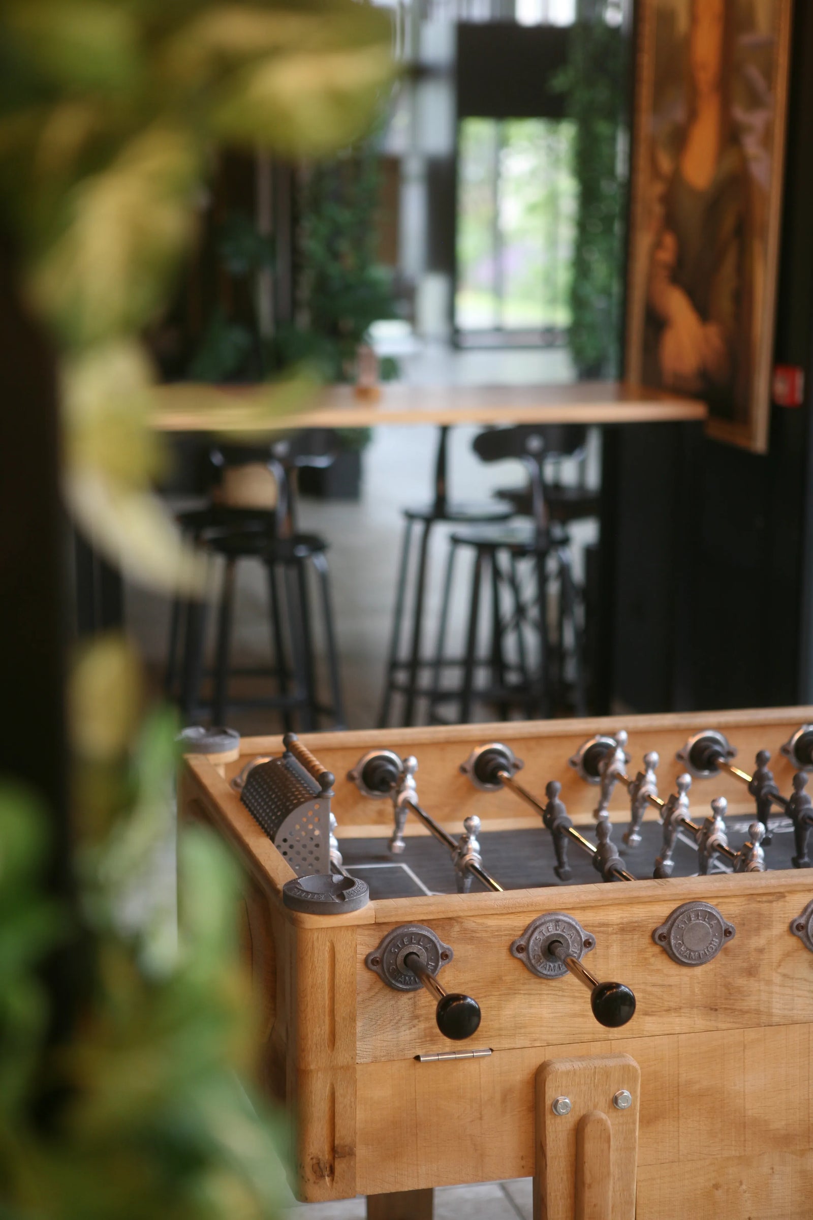 Close-up of the painted aluminum players and sturdy rods on the Stella Retro foosball table